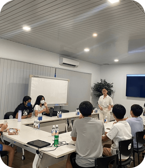 Students engaged in an interactive public speaking workshop at Speakaso Academy