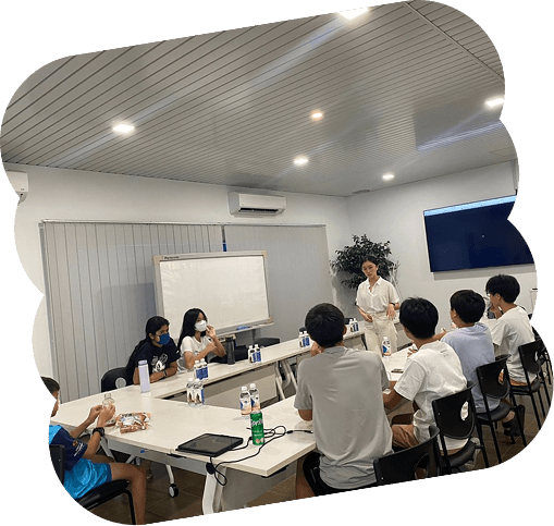 Students practicing debate skills in classroom setting